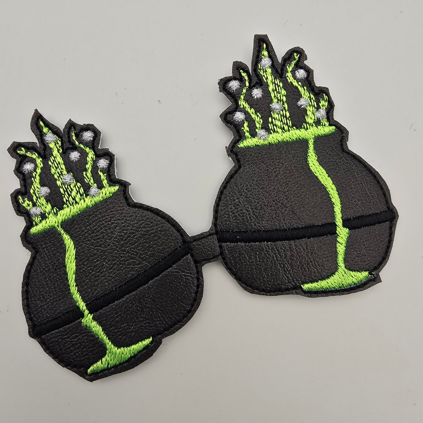 Cauldron Embroidered Bow Tails