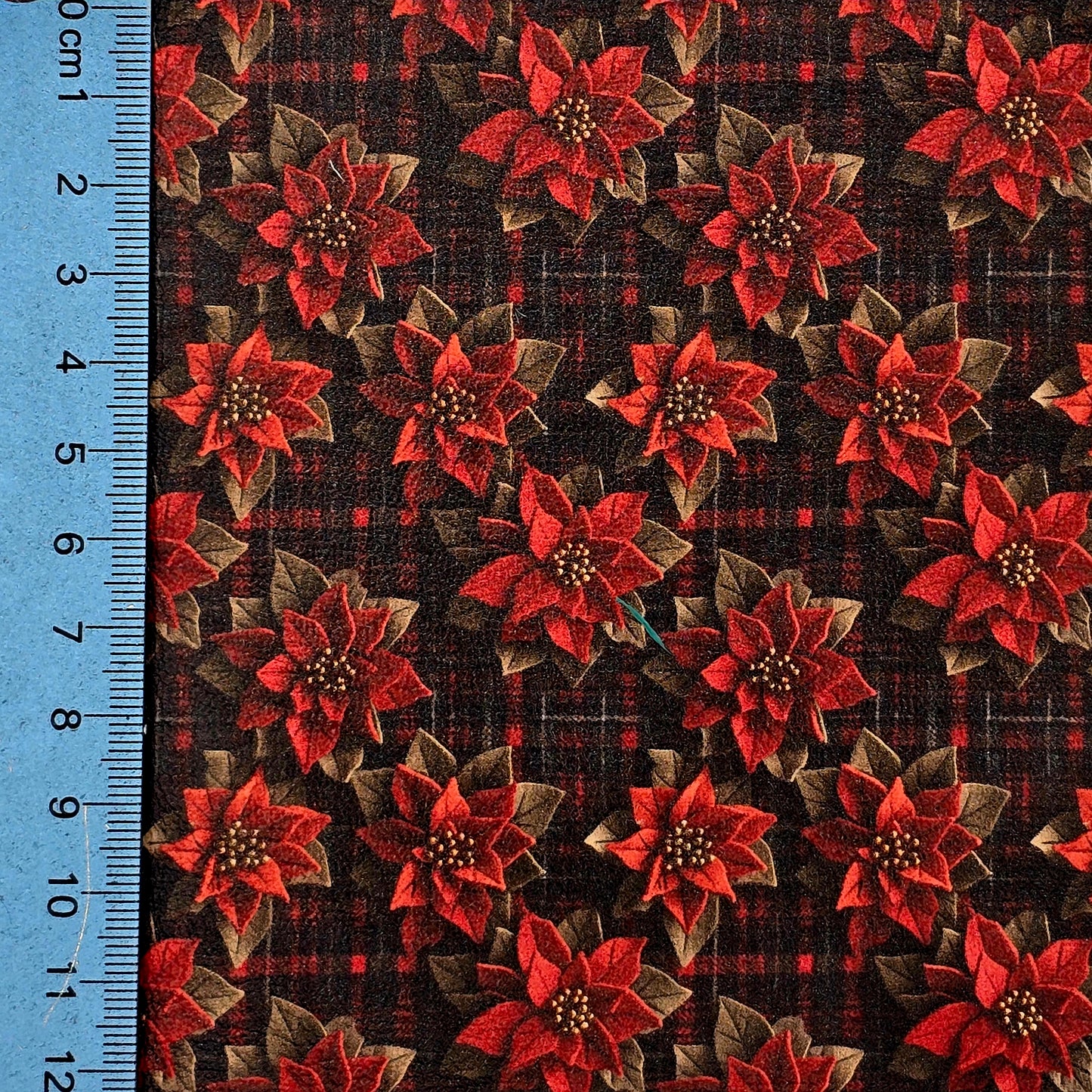 Poinsetta on Tartan Artisan Leatherette