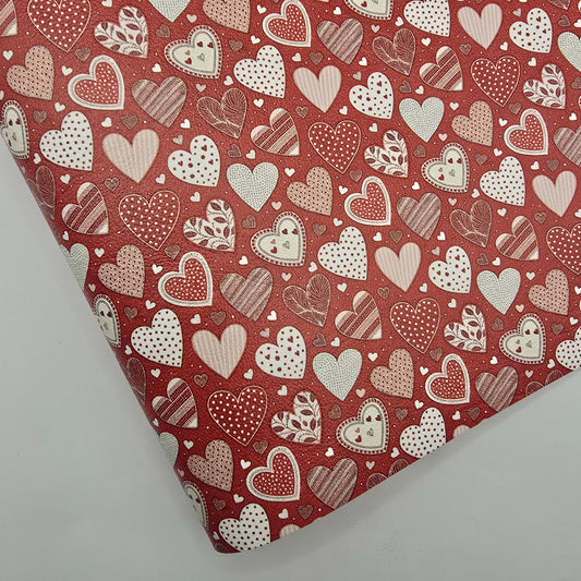Patterned Hearts on Red Artisan Leatherette