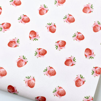 Strawberry bows on pale pink Artisan Leatherette